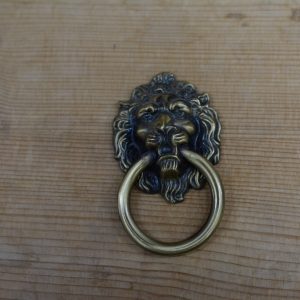 POMELLO AD ANELLO CON TESTA DI LEONE